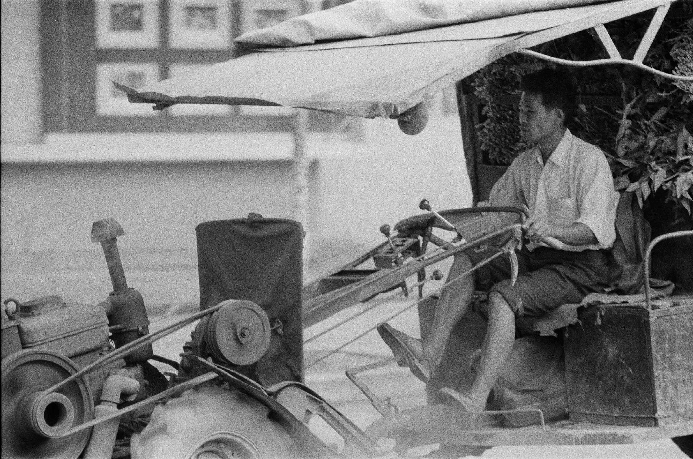An agricultural-type vehicle in a Hà Nội street.